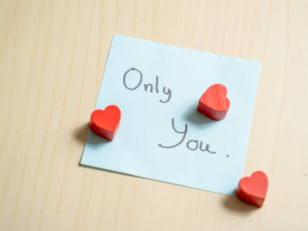 istock Romantic gesture heart-shaped tokens on note home digital intimate setting close-up love expression 2187786608