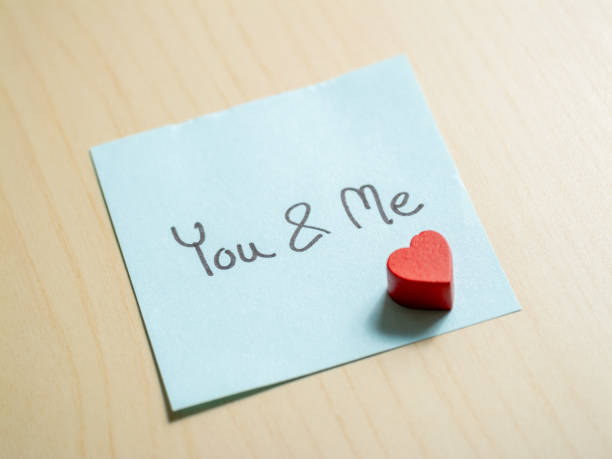 istock Romantic note with heart desk interior close-up love concept 2187787501