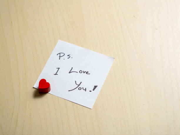 istock Close-up of a romantic love note with heart charm in an affectionate home setting 2187787958
