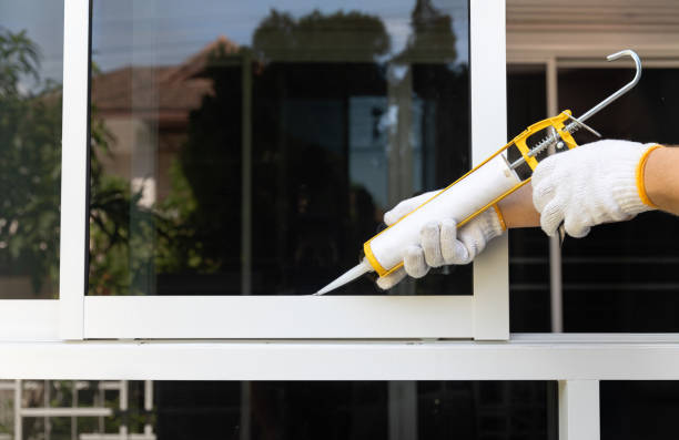 istock Construction worker using silicone sealant caulk for repair leaked inside window frame. 2187791006