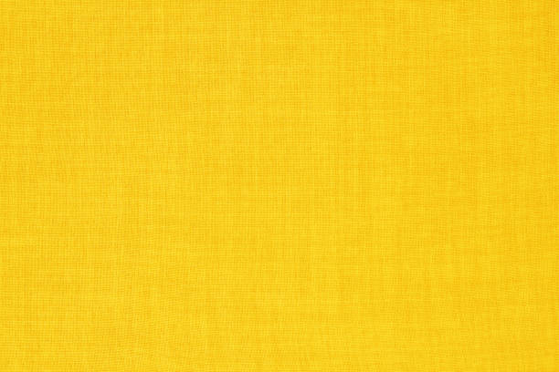 istock Yellow gold linen fabric cloth texture for background, natural textile pattern. 2187792253
