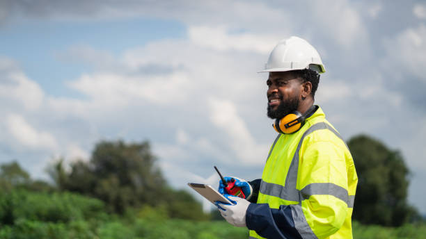 istock Service engineers checking system of windmill. Wind turbines generate electricity. Clean and Renewable energy concept. 2187795093