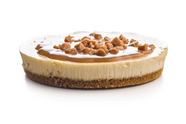 istock Cheesecake with caramel topping isolated on white background. 2187796737