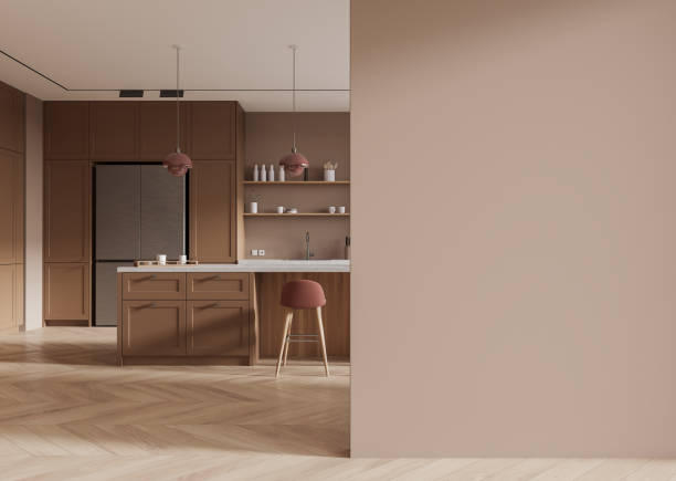 istock Empty wall mockup in modern kitchen with wooden cabinetry and barstool. 3D Rendering 2187797100