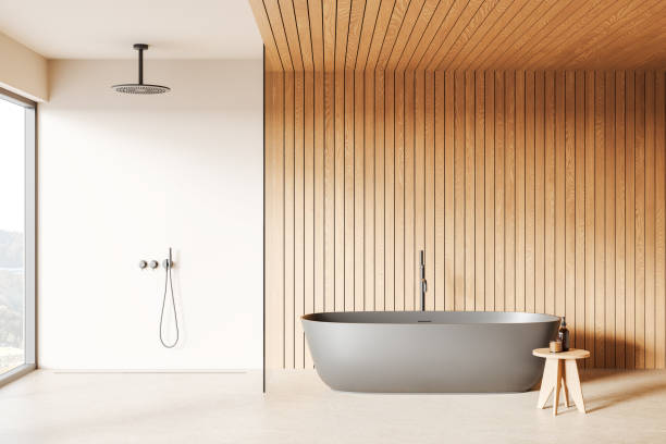 istock Light hotel bathroom interior with tub and shower, panoramic window 2187797601