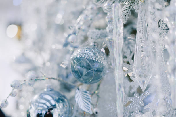 istock A Christmas tree with a blue ornament hanging from it 2187797758