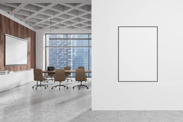 istock Empty billboard on a white wall in a modern office with a conference room in the background. Concept of advertising. 3D Rendering 2187797765
