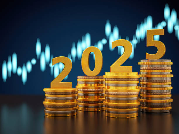 istock 2025 Finance Concept with Gold Coins and Candle Stick Chart 2187797863