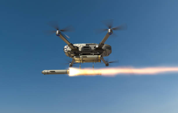 istock Military drones fly and fire missiles in a war zone, Future war with drone. 2187797893