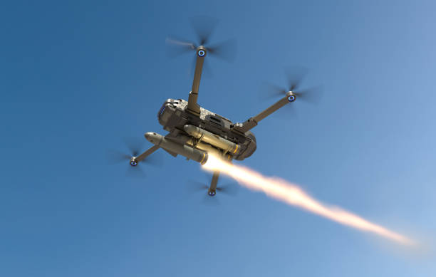 istock Military drones fly and fire missiles in a war zone, Future war with drone. 2187797926