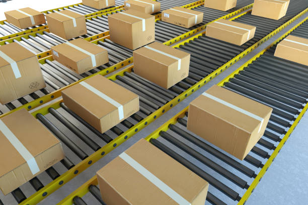 istock Shipping Boxes Concept. Cardboard Boxes on Conveyor Belt 2187797931