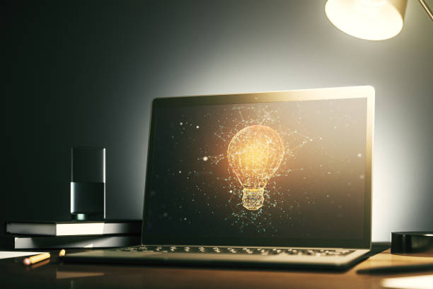 istock Creative light bulb hologram on modern laptop monitor, idea concept. 3D Rendering 2187798195