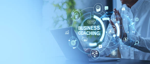 istock Man hands touch business coaching and mentoring icons, using laptop. Copy space 2187798272
