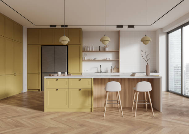 istock Modern kitchen with mustard cabinets and wooden island. 3D Rendering 2187798381