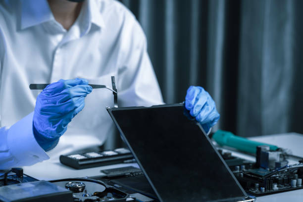 istock killed hands repairing electronic devices with precision. technology repair, technician expertise, and modern electronic maintenance. 2187800561