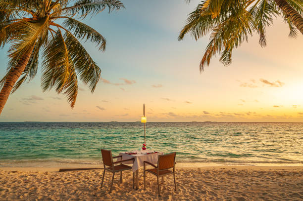 istock Romantic sunset dinner on the tropical paradise beach 2187801755