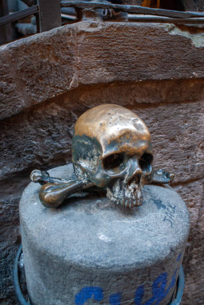 Italy, Napoli, Decumani - (11/30/2024) the baroque skulls of the anime pezzentelle also known as capuzzelle in front of the old church of the Purgatory
