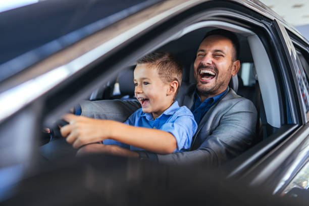 istock Joyful Father and Son Bonding Over a Fun Car Ride 2187803243