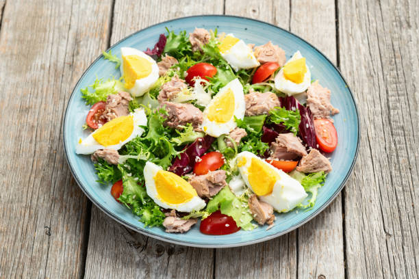 istock Canned Tuna salad with eggs and tomatoes photography . Top view 2187803654