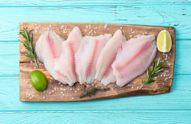 istock Raw tilapia fillet photography . Top view 2187803680