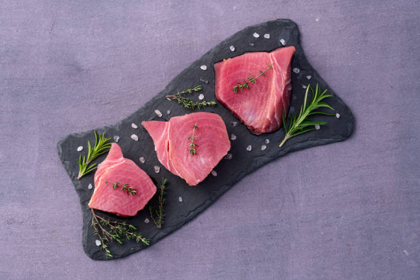istock Raw tuna steak ( fillet ) photography . Top view 2187803732