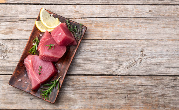 istock Raw tuna steak ( fillet ) photography . Top view 2187803738