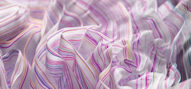 istock Whispers of Elegance: Flowing Translucent Fabric in Pink and Lavender 2187803894
