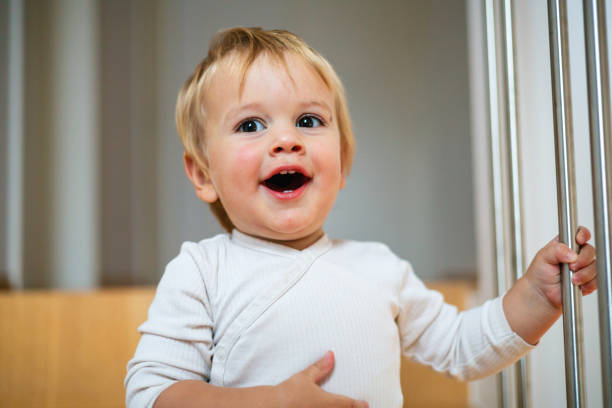 istock Adorable Baby Smiling Indoors 2187806349