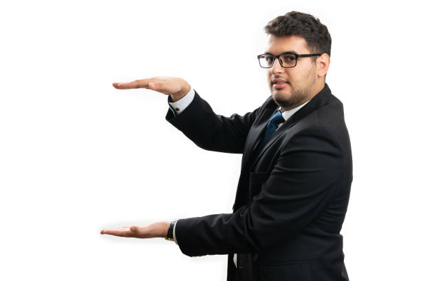 istock Adult businessman holding copyspace between palms presenting 2187807972