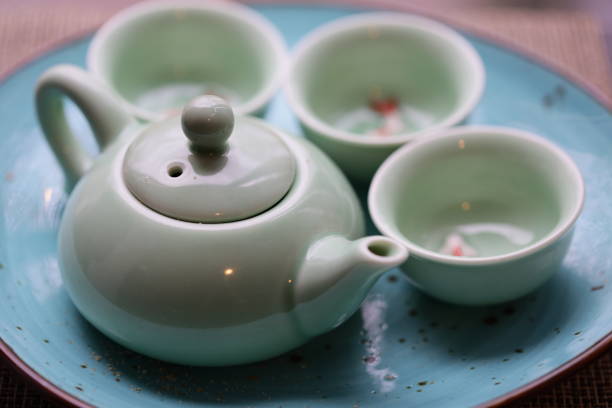 istock Four cups on a plate ready for a tea party, no tea or saucers in sight 2187808086