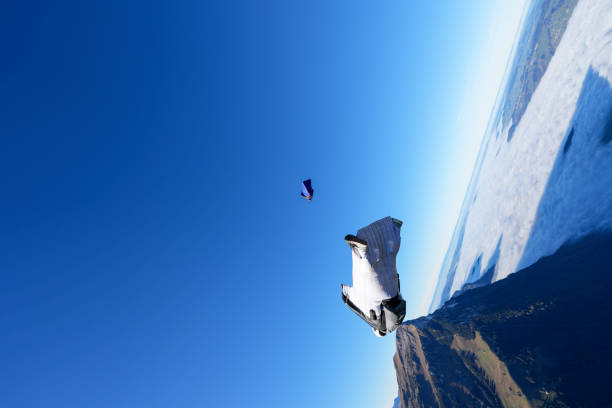 An ultralight trike or paratrike. A type of motorized hang glider with a fabric wing from which a three-wheeled fuselage gondola hangs. The gondola has space for a pilot and a passenger.