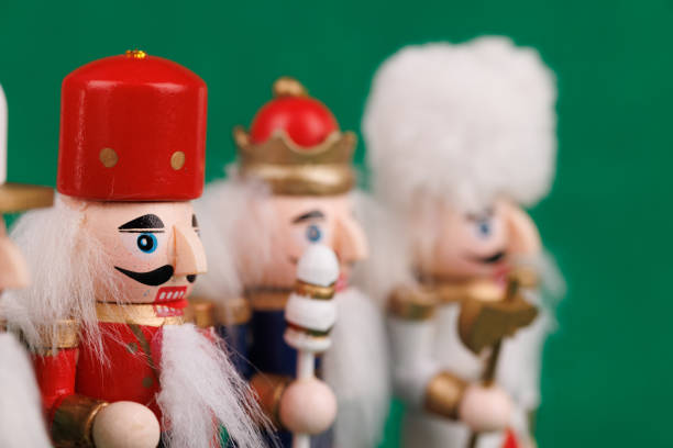 Two Santas on gray background
