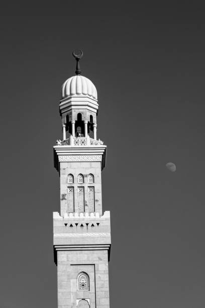 istock Black and white mosque minaret with moon. 2187809008
