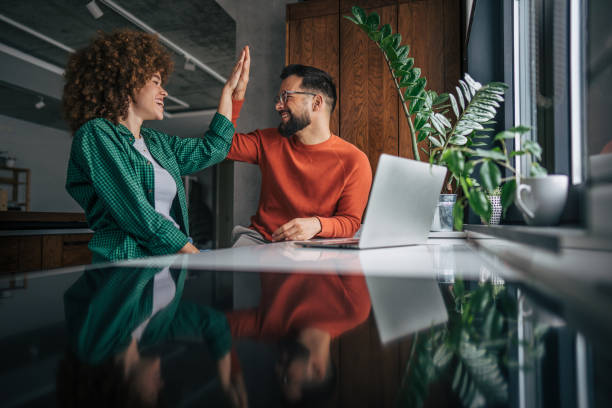 istock Morning routine of happy couple on laptop 2187809085
