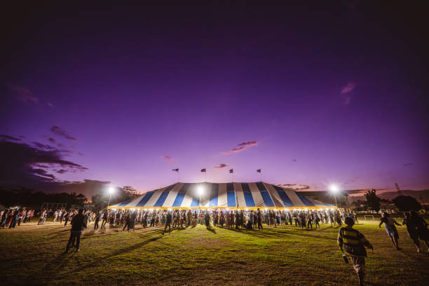 Florida, United States – November 20, 2024: A giant circus tent illuminated by the setting sun