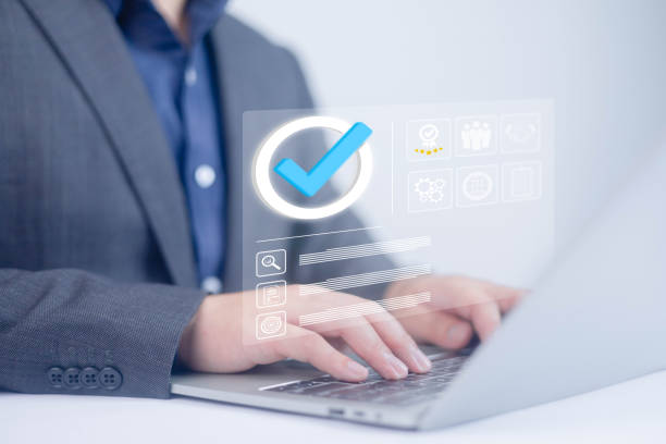 istock Business performance checklist concept, Take an assessment business man, Businessman using laptop online an checklist survey filling form list options business employee security procedures. 2187814704