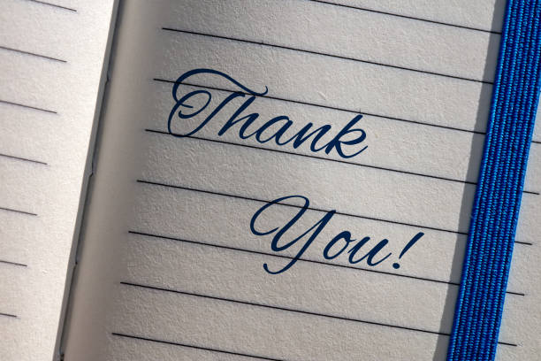 istock THANK YOU! written on a notebook page 2187815874