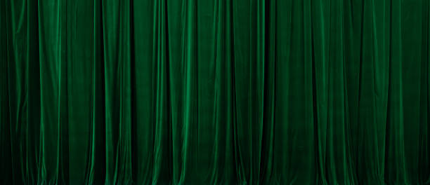 istock Green curtain in theatre background 2187818308