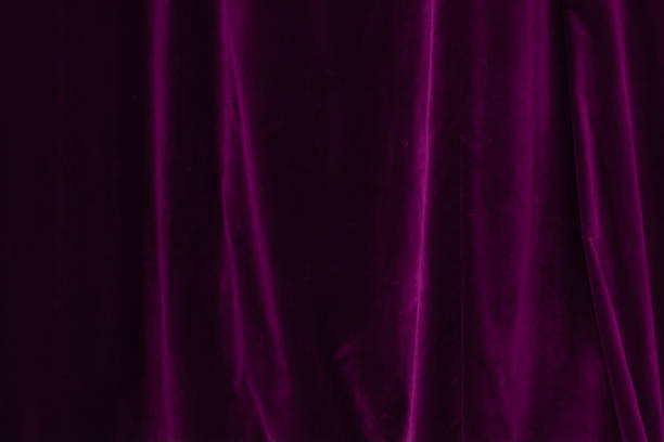 istock Purple curtain in theatre background 2187819001