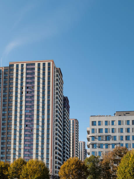 istock Apartment Buildings Under a Clear Blue Sky 2187821515