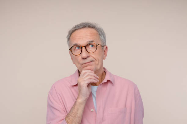 istock Headshot of thoughtful senior man 2187822393