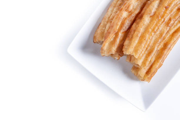 churros in paper packaging isolated on white background