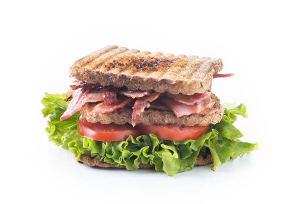 istock Sandwich with bacon and vegetables isolated 2187824593