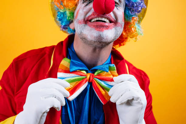 Child clown boy performing at stage theater