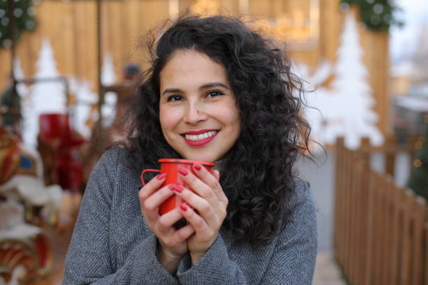 Beautiful woman enjoying christmas time stock photo