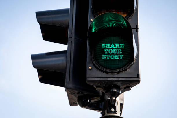 istock Share Your Story Concept. Traffic Light with green light 2187828524
