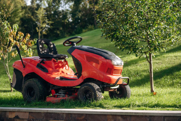 istock Lawn mover is on the green grass at daytime 2187831908