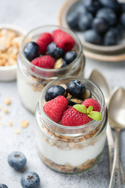 istock Greek yogurt parfait with fresh berries 2187834239