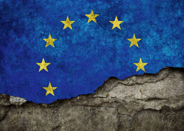 istock European Union flag on damaged wall - EU symbol 2187834830