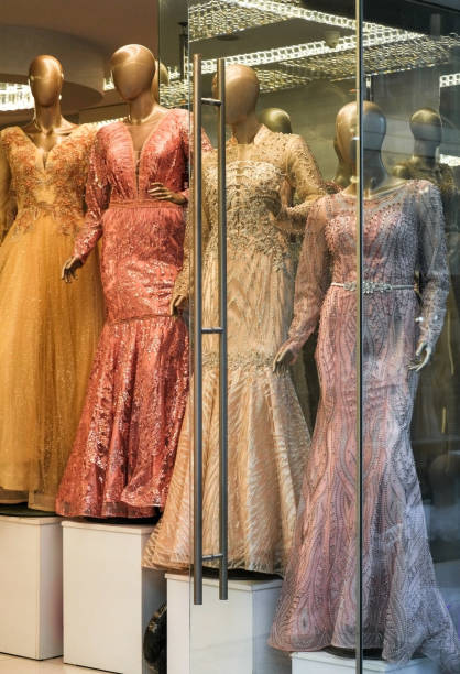 istock Evening dresses in the shop window 2187838273